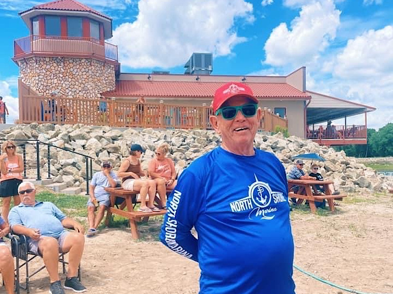 Dude hanging out in front of marina